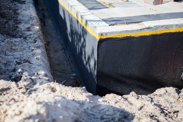 Professional Waterproofing technician working in Dorr, MI